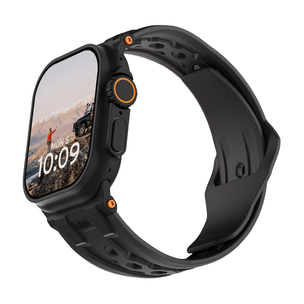 Bracelet silicone noir robuste avec détails orange pour Apple Watch, design perforé et fermoir métal.