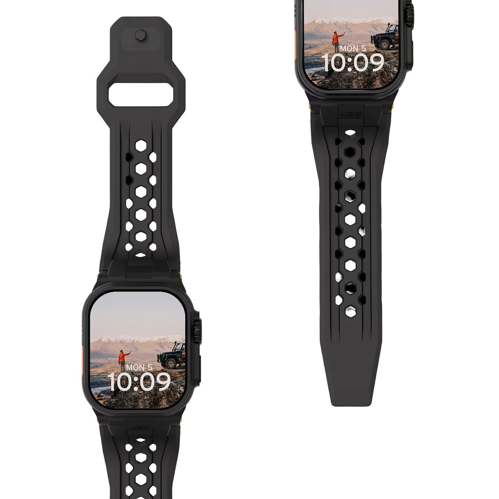 Bracelet noir en silicone perforé, design robuste avec fermoir métallique pour Apple Watch, style outdoor.