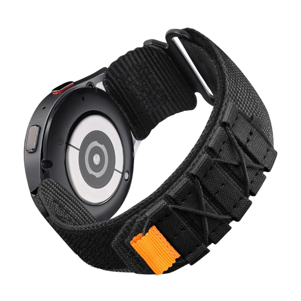 Bracelet nylon noir sport avec fermeture velcro et détail orange pour Samsung Galaxy Watch.