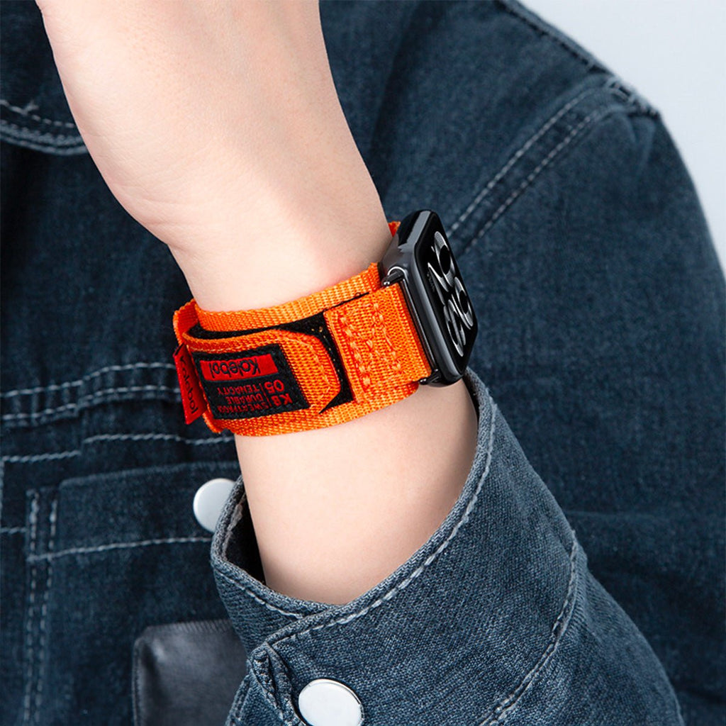 Bracelet en nylon orange à velcro pour Apple Watch, modèle Kayle, ajustable, style sportif.