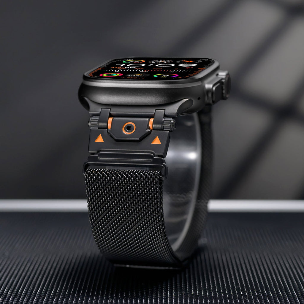 Bracelet tactique magnétique noir en acier inoxydable pour Apple Watch avec maillage ajustable.