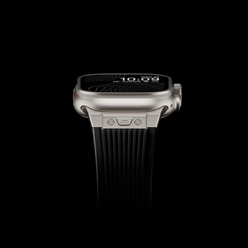 Bracelet tactique noir en silicone avec texture rainurée et fermoir papillon argenté pour Apple Watch.