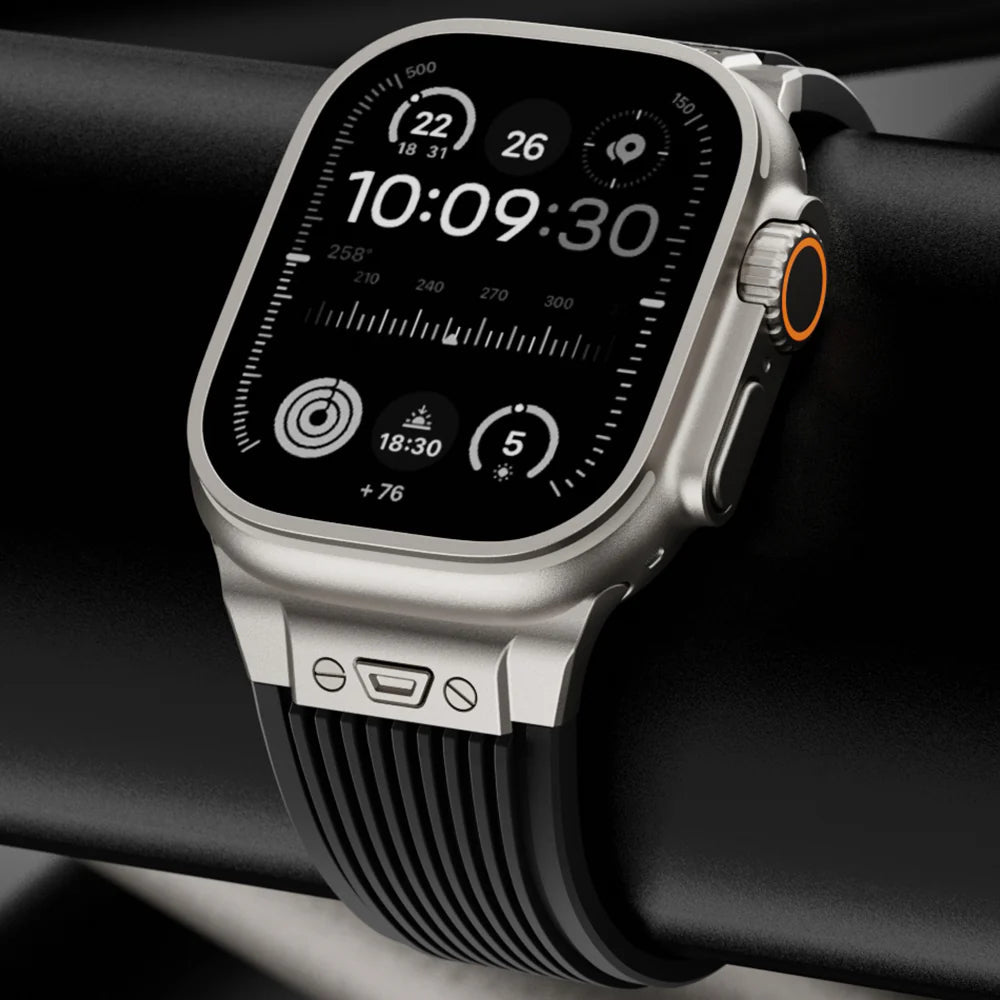 Bracelet silicone noir à rainures pour Apple Watch avec fermoir papillon argenté, modèle Balinor.