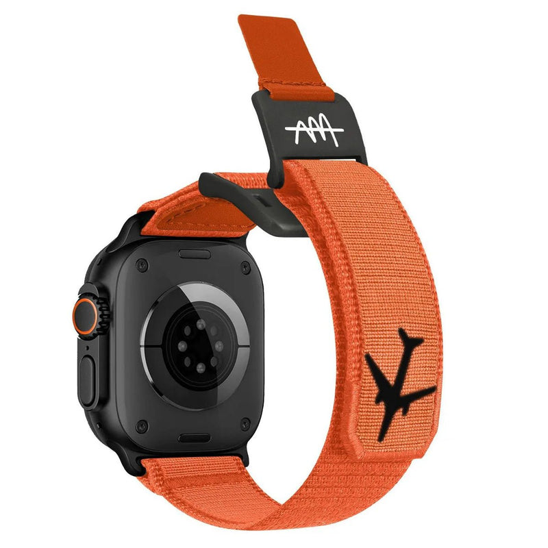 Bracelet tactique orange et noir pour Apple Watch, tissu résistant avec logo avion noir.