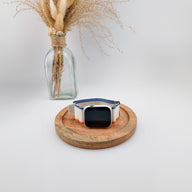 Bracelet Apple Watch en nylon bleu, blanc et orange avec fermeture velcro, style Trail Edition Elios.