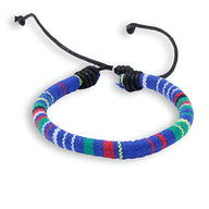 Bracelet tressé en coton bleu, vert, rouge et jaune avec fermeture réglable noire.