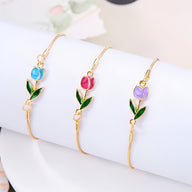 Bracelets fins en cuivre avec pendentifs tulipe colorés rose, rouge et violet, feuilles vertes émaillées.