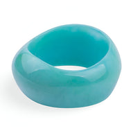 Bracelet épais en acrylique turquoise lisse avec finition brillante pour femme.