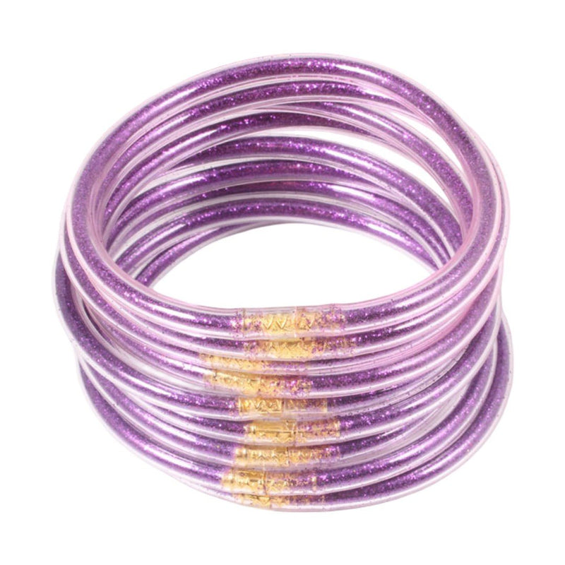 Ensemble de neuf bracelets joncs empilables en silicone souple violet brillant avec touches de dorure scintillante, style.