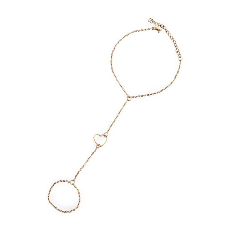 Bracelet chaîne de doigt en acier inoxydable doré avec cœur central ajouré.