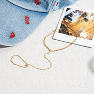 Chaîne de doigt en acier inoxydable plaqué or avec maille fine et brillante style maille de café.