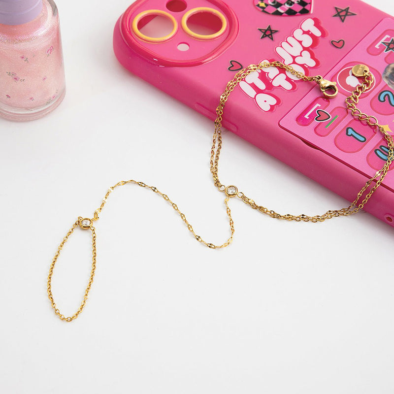 Chaîne de doigt fine en acier inoxydable plaqué or avec maille café brillante, fermeture clapet.