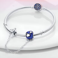 Bracelet argent à chaînette avec charm bleu ciel et avion en argent modèle Adelaida.