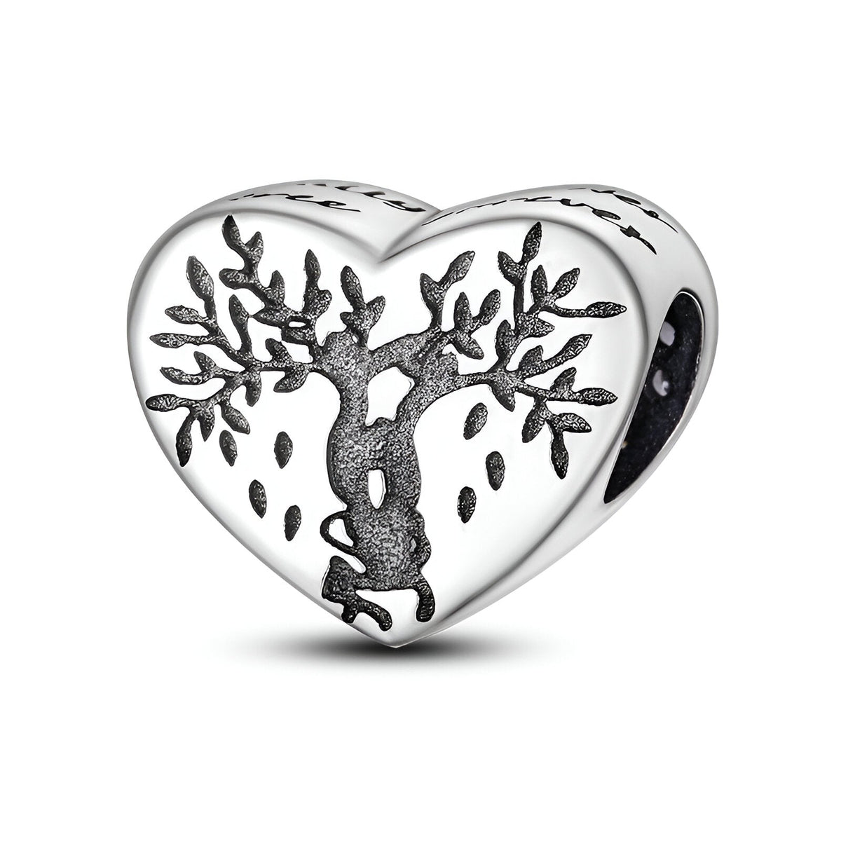 Charm cœur argenté avec arbre de vie gravé, détails finement ciselés, style élégant et symbolique.