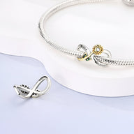 Charm infini en argent avec tournesol jaune et centre vert, style délicat pour bracelet.