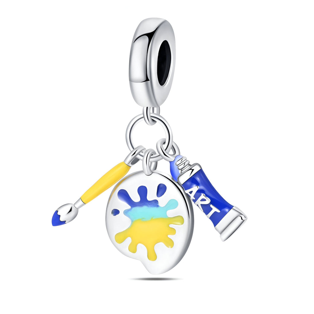 Charm pendentif argent avec palette colorée, pinceau jaune, tube de peinture bleu "Art".