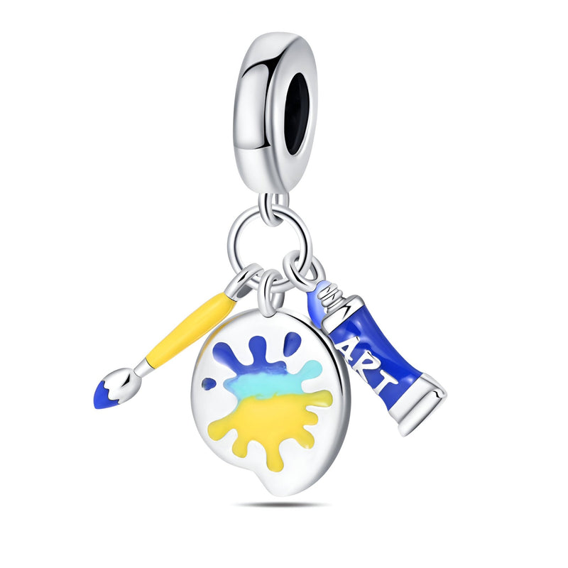 Charm pendentif argent avec palette colorée, pinceau jaune, tube de peinture bleu "Art".