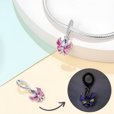 Charm pendentif papillon en argent avec ailes roses et détails lumineux, modèle Agnetha.