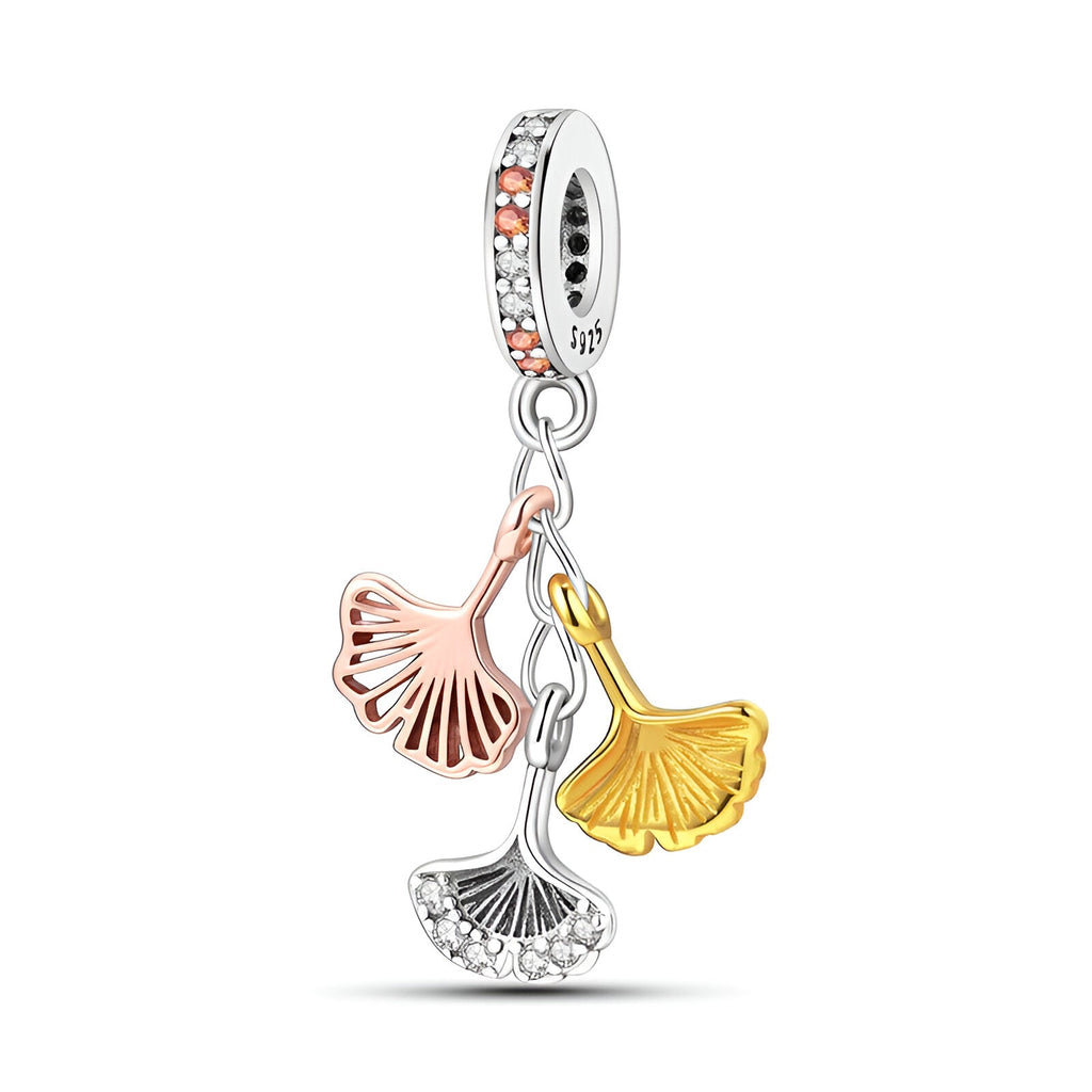 Charm pendentif feuilles de Ginkgo en argent, or rose et or jaune, accroche anneau serti de pierres blanches.