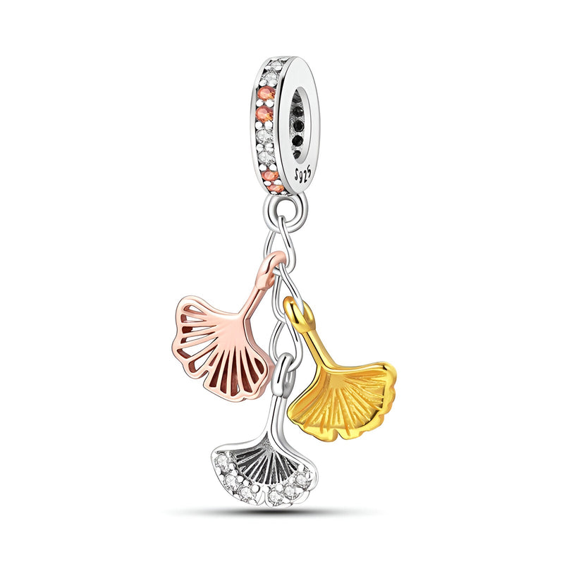 Charm pendentif feuilles de Ginkgo en argent, or rose et or jaune, accroche anneau serti de pierres blanches.