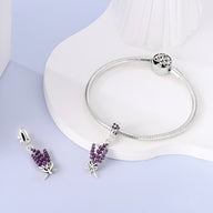 Bracelet argent avec pendentif bouquet de lavande violet détail étoile.