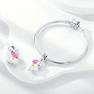 Bracelet chaîne serpent argent avec pendentif signe zodiaque Bélier rose et blanc.