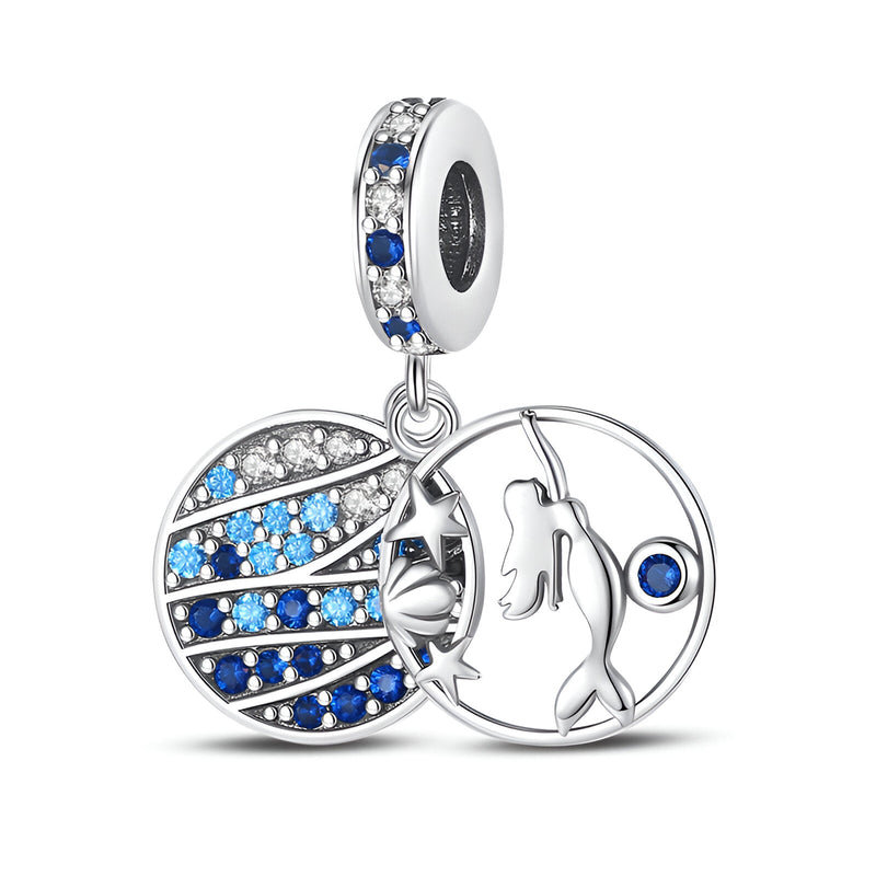 Charm pendentif sirène et coquillage en argent avec cristaux bleus et blancs, détail pierre bleue.