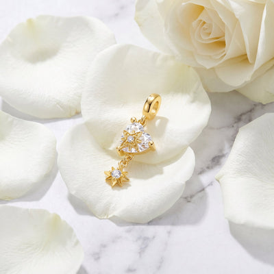 Zircon heart charm with cascading stars, gold finish, Golden Shooting Star Heart model
