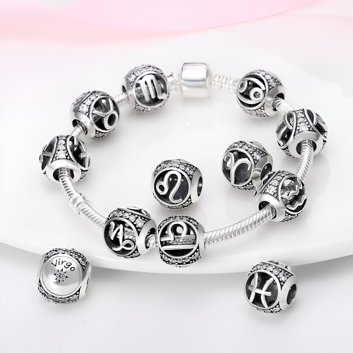 Charm rond, signe du zodiaque balance, pour femme, modèle Thora - La Boutique du Bracelet