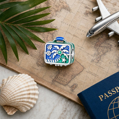Charm spacer, tropisk blå og grøn kuffert, til kvinder, model Tropica