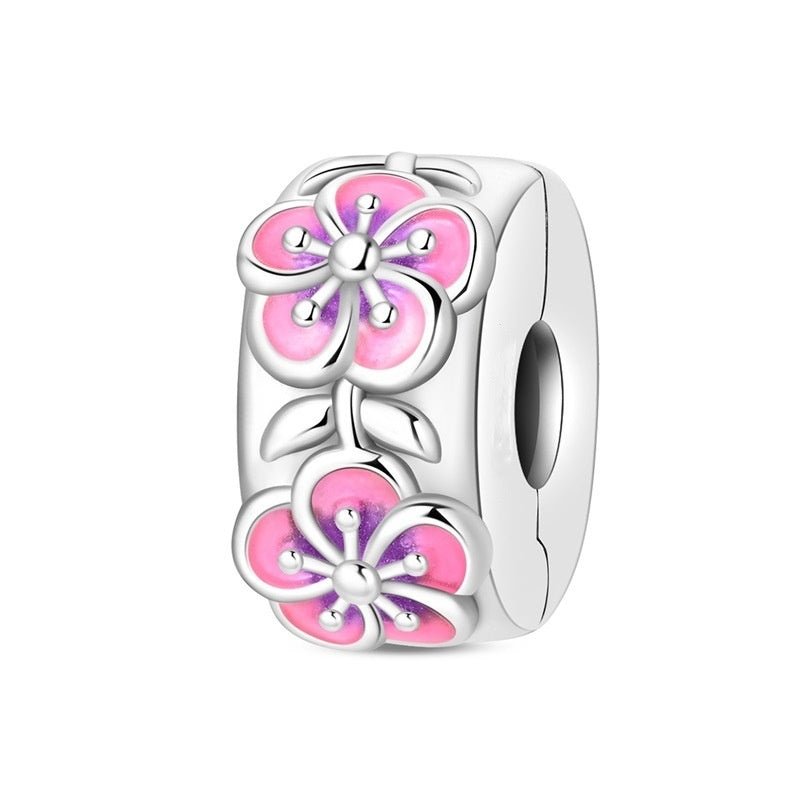 Clip, Clip chaîne de sécurité fleurs émaillées rose et violet phosphorescentes, pour femme, modèle Fleurs de Cerisier Nocturnes