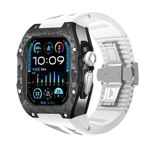 Montre Apple Watch Ultra avec coque noire en fibre de carbone, bracelet blanc en silicone et acier à boucle déployante,.