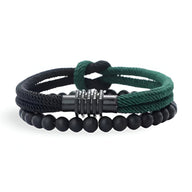 Duo de bracelets homme cordon vert et noir avec perles d'onyx noires et noeud central noir métallique.
