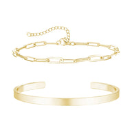 Duo de bracelets homme en acier inoxydable doré, jonc lisse et chaîne fine maillons allongés.