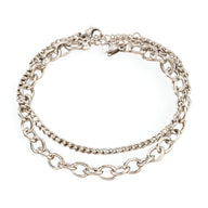 Duo de bracelets en acier inoxydable argenté, chaînes fines et maillons ovales, fermoirs lobster clasp.