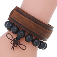 Duo de bracelets marron, large cuir lisse et perles noires en bois avec nœud décoratif.