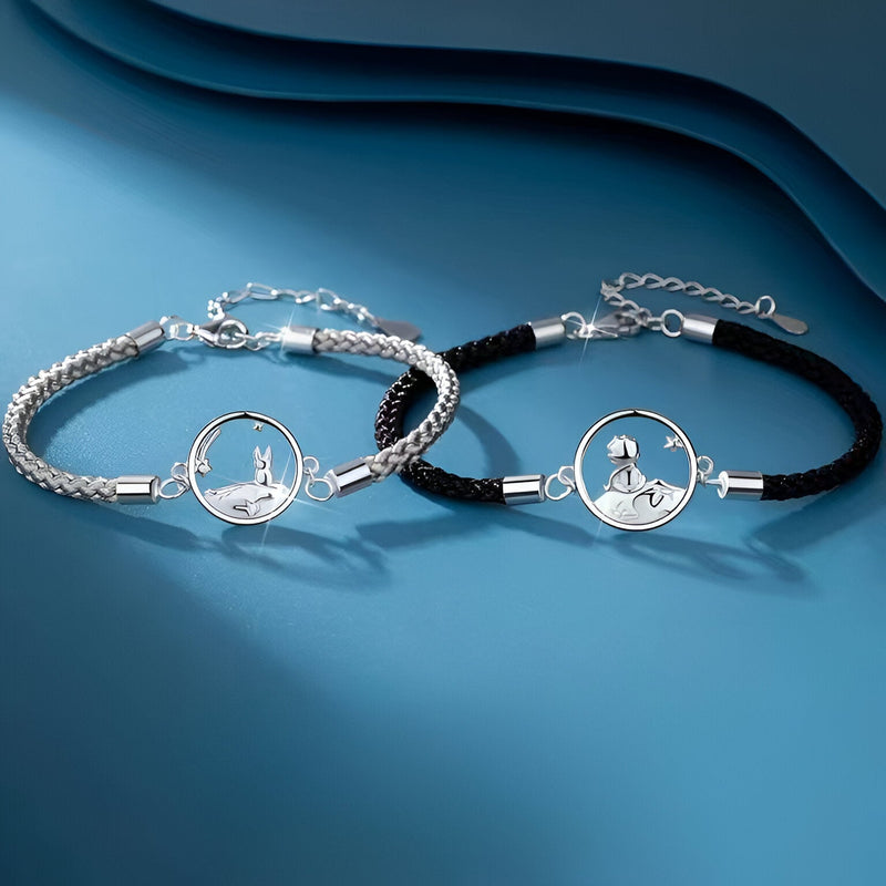 Duo de bracelets mixtes plaqué argent avec cordon gris clair et noir et médaillons Le Petit Prince.