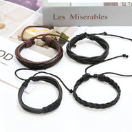 Ensemble de 4 bracelets vintage unisexe en cuir noir et brun avec fermoirs coulissants.
