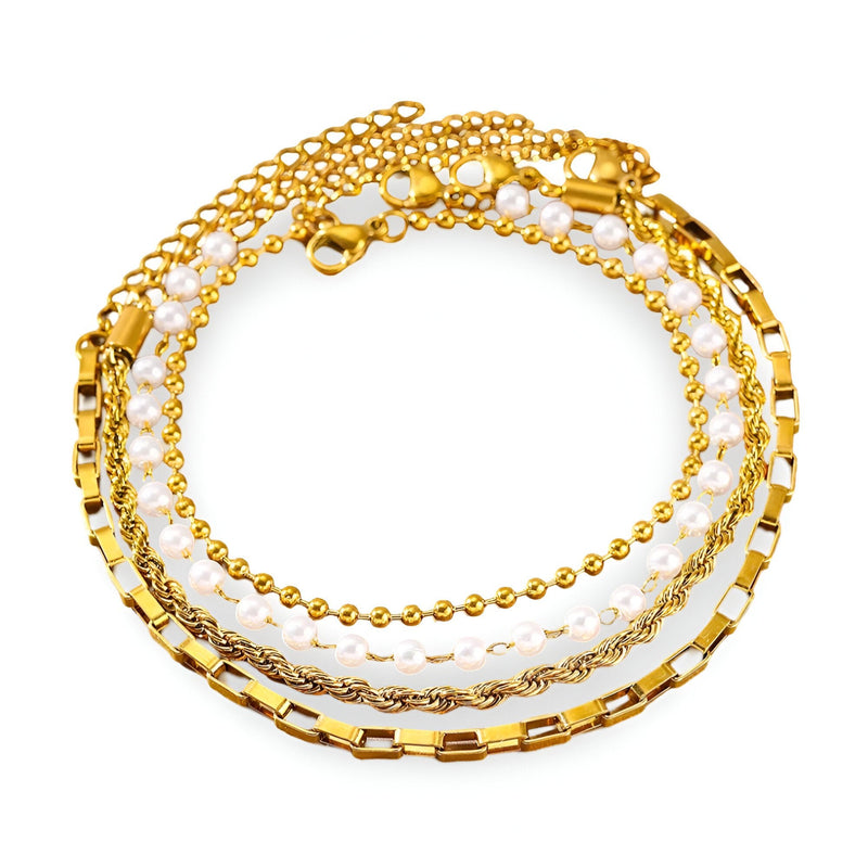 Ensemble de 4 bracelets dorés en acier inoxydable avec différentes textures et motifs, style Jovina.