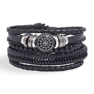 Ensemble de 4 bracelets noirs en microfibre et bois avec motif mandala central argenté, styles tressés et perles mates.