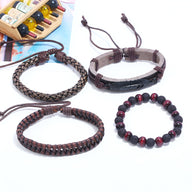 Ensemble de 4 bracelets homme noirs en microfibre tressée et pierres volcaniques rouges et noires.