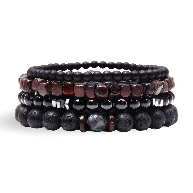 Ensemble de quatre bracelets noirs en bois et pierres volcaniques avec perles mates et brillantes, style homme Milan.
