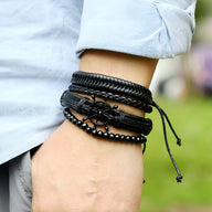 Ensemble de 4 bracelets noirs en cuir et perles avec motif gouvernail pour homme.