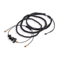 Ensemble de bracelets noirs en pierres naturelles et perles, style tressé avec fermoirs coulissants.