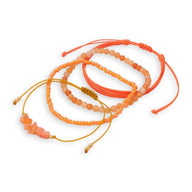 Ensemble de bracelets cornaline en pierres naturelles et cordons orange avec perles dorées ajustables.