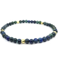 Bracelet homme perles rondes lapis lazuli bleu et vert avec accents dorés, style tibétain élégant.