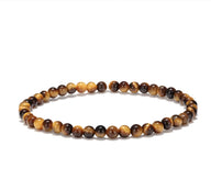 Bracelet homme perles œil de tigre marron lustré finition élégante ronde.