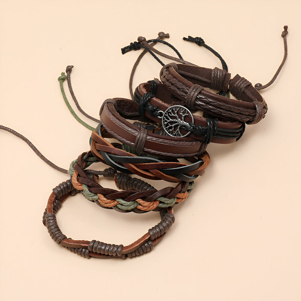 Ensemble de 6 bracelets en cuir marron, styles tressés et lisses, avec pendentif arbre de vie en métal noir.