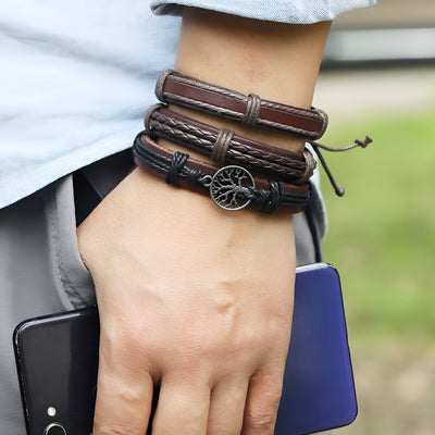 Ensemble de 6 bracelets en cuir marron avec arbre de vie en métal noir pour homme, style multiple et ajustable.