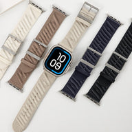 Bracelets Apple Watch en silicone tressé respirant beige, brun, gris, bleu marine et noir, fermoir métallique argenté.
